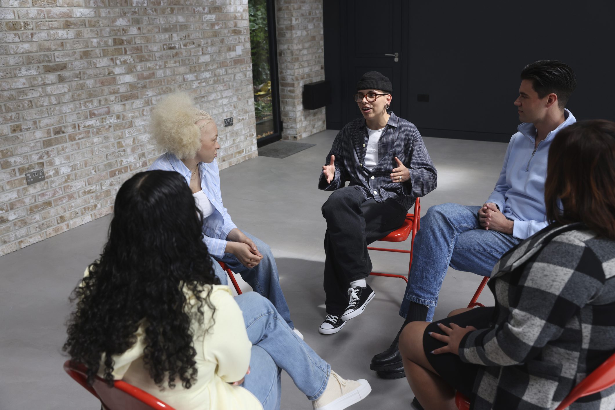 People talking during group therapy Intensive Outpatient Program (IOP)